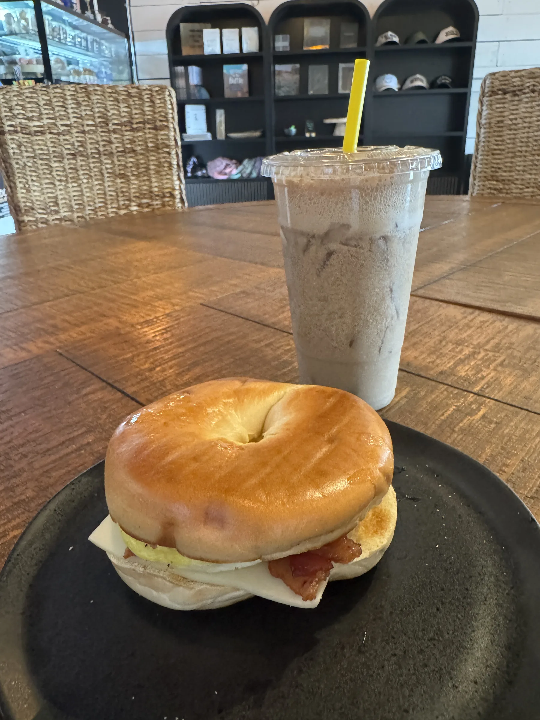 Young Bucks bagel sandwich with iced coffee
