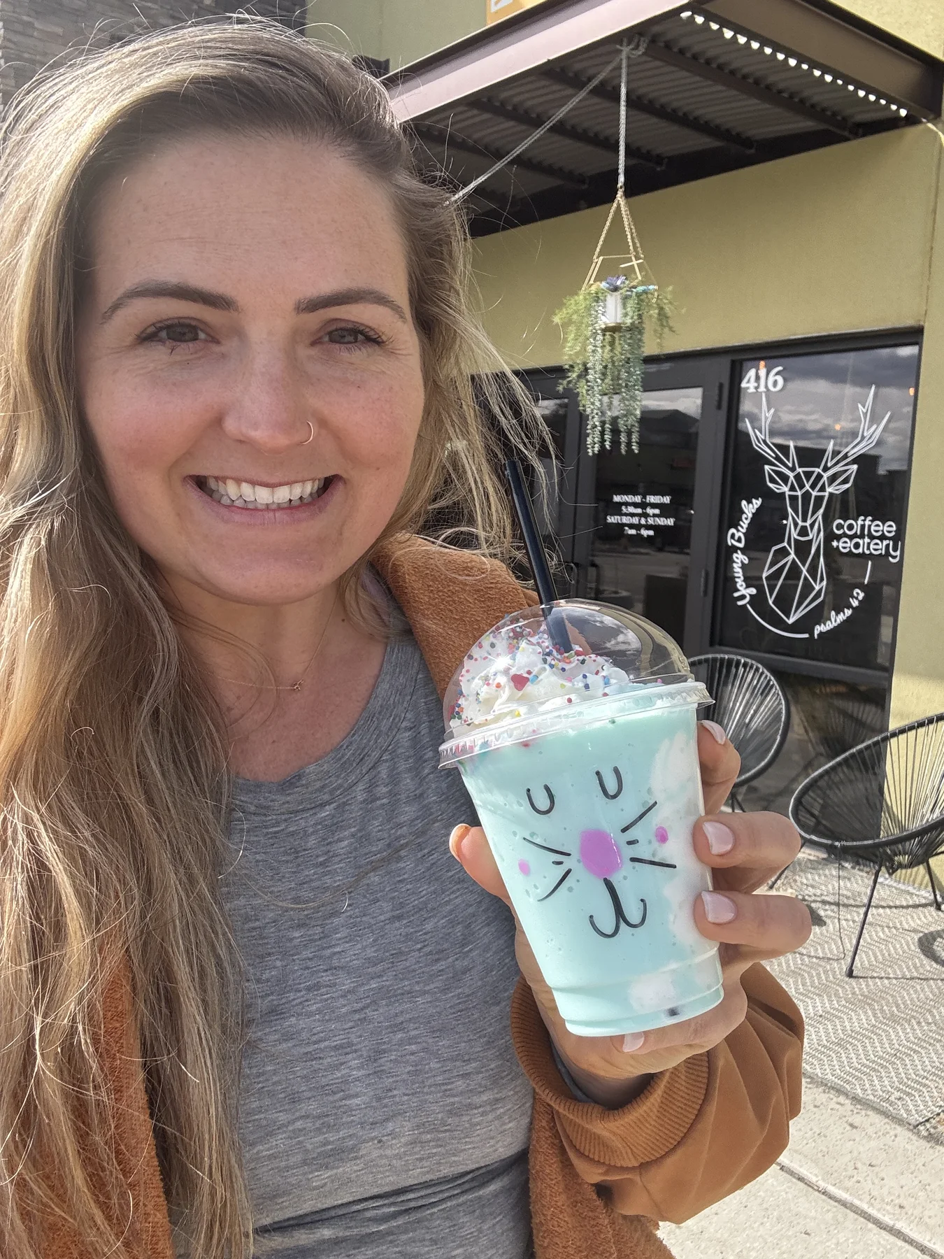 Signature blue drink outside The Cabin